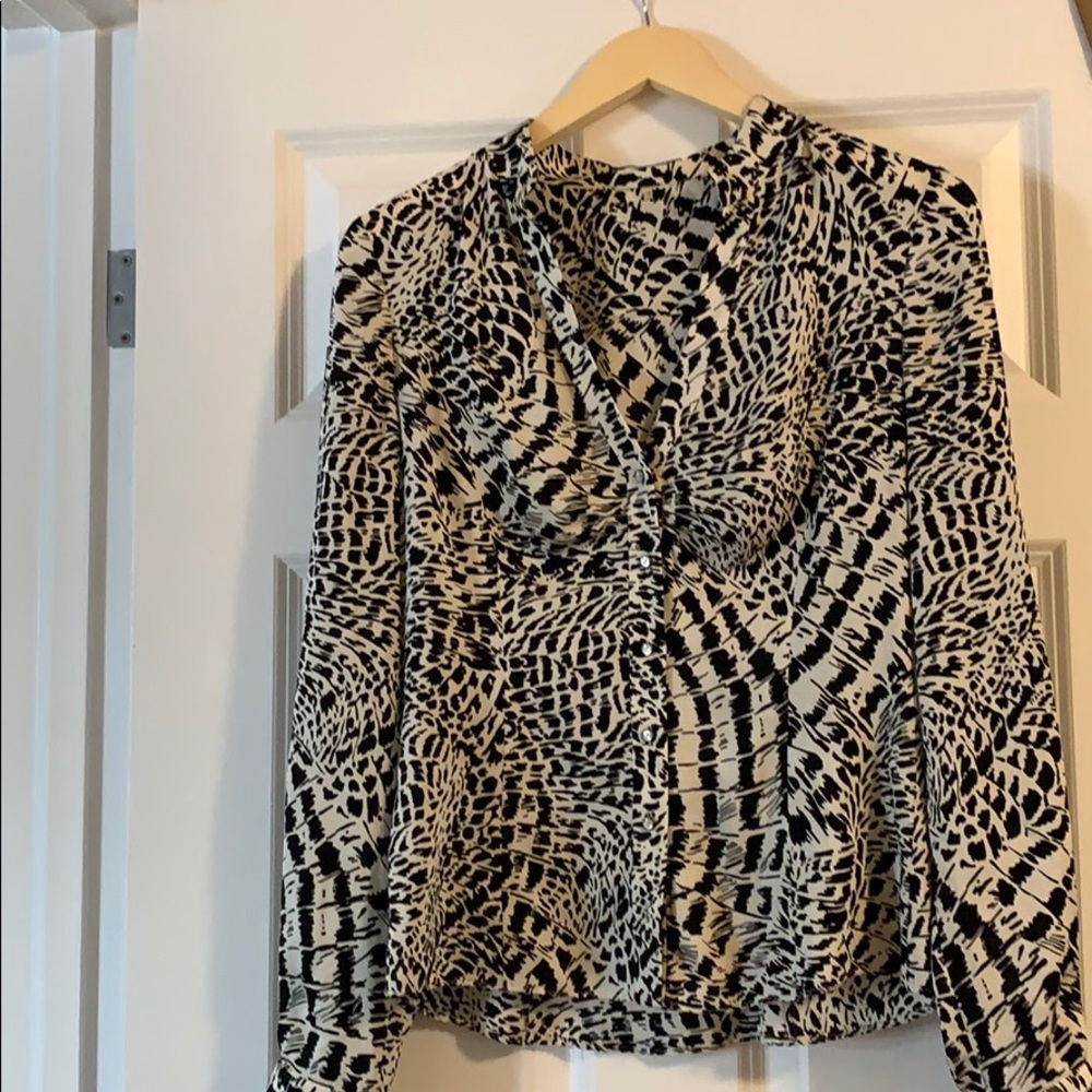 Silk Elie Tahari v neck blouse. Animal print